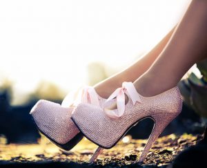 Close up of a pink high heels with diamons